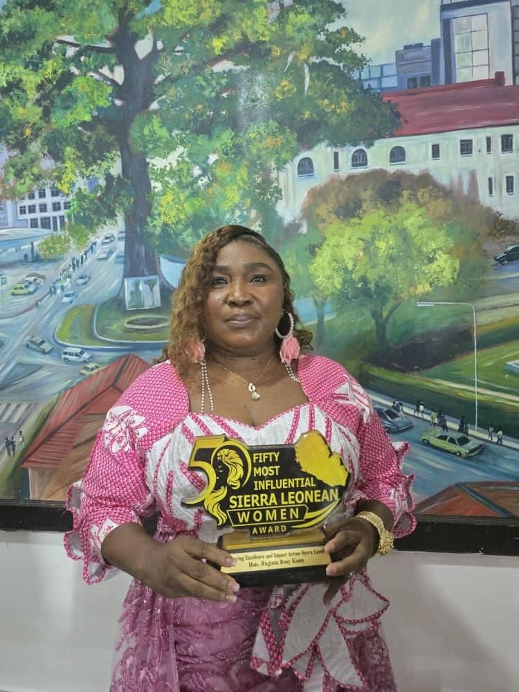 Hon. Rugiatu Rosy Kanu with her award